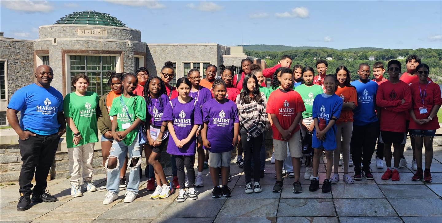  Marist Liberty Partnerships Program participants pose on Marist University's campus.